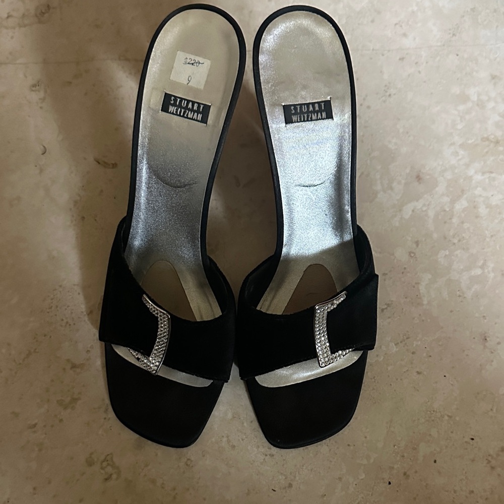 Stuart Weitzman Black Mules with Silver Buckle
